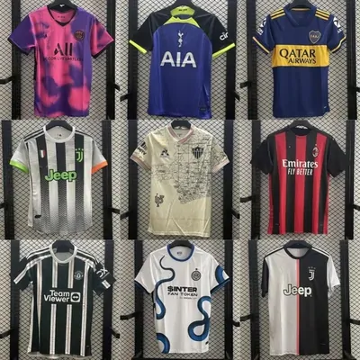 A shop wall of football shirts in club colours hung in three rows on metal rails